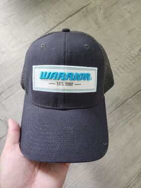 Black Trucker Hat with Teal Embroidered Patch